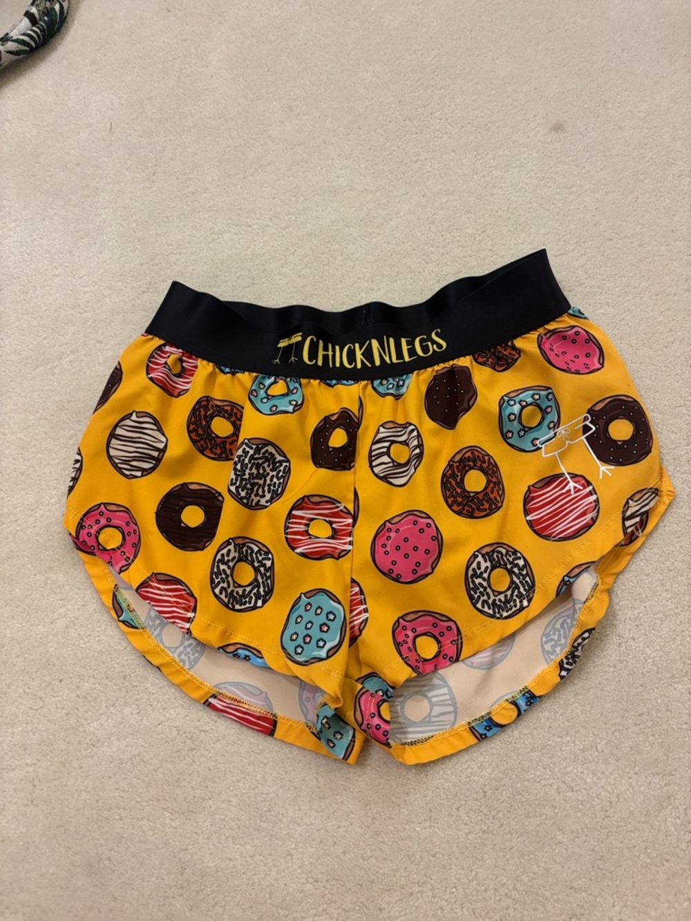 Chicknlegs Women’s Yellow Donut Print Athletic Shorts